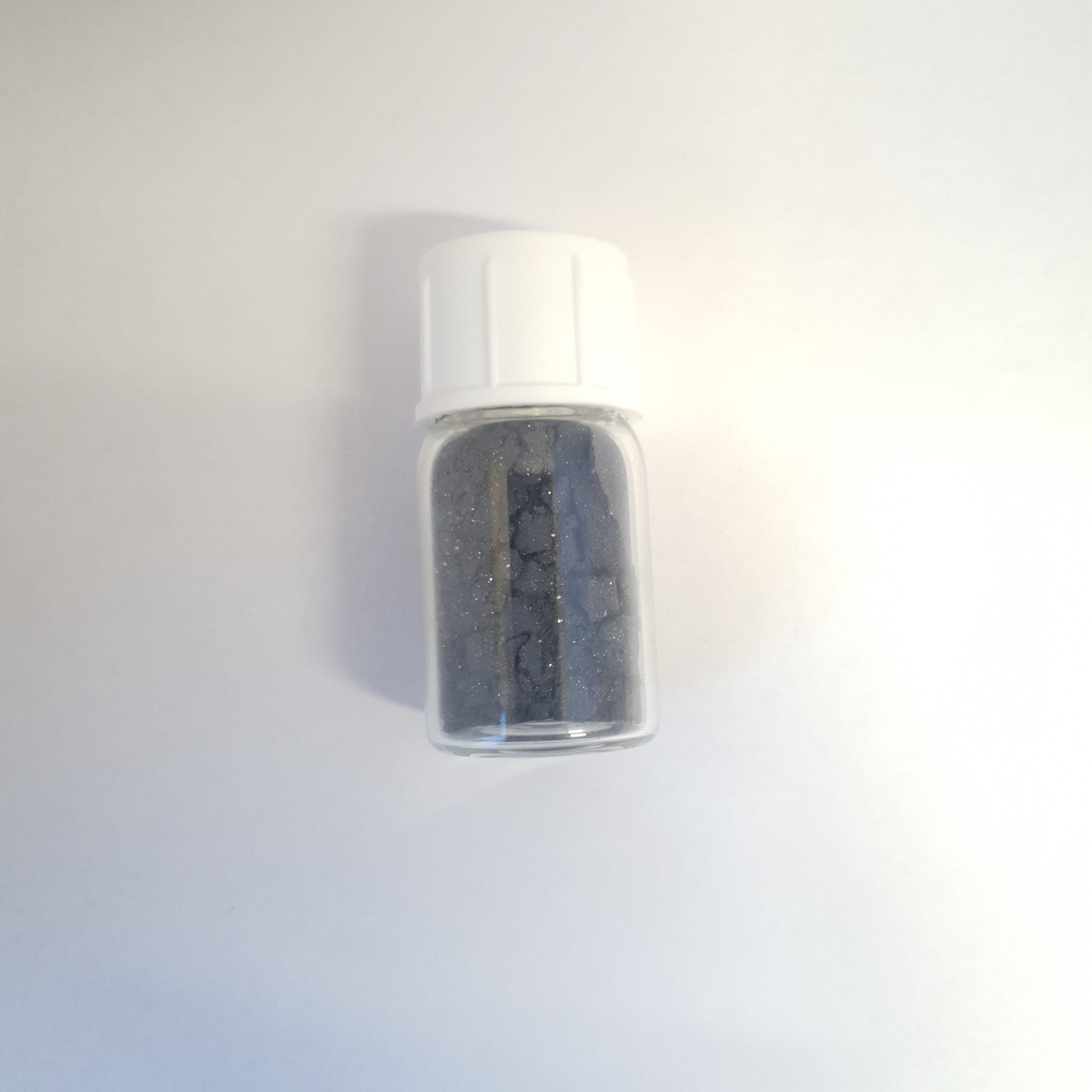 arabic kohl eyeliner powder in small glass bottle