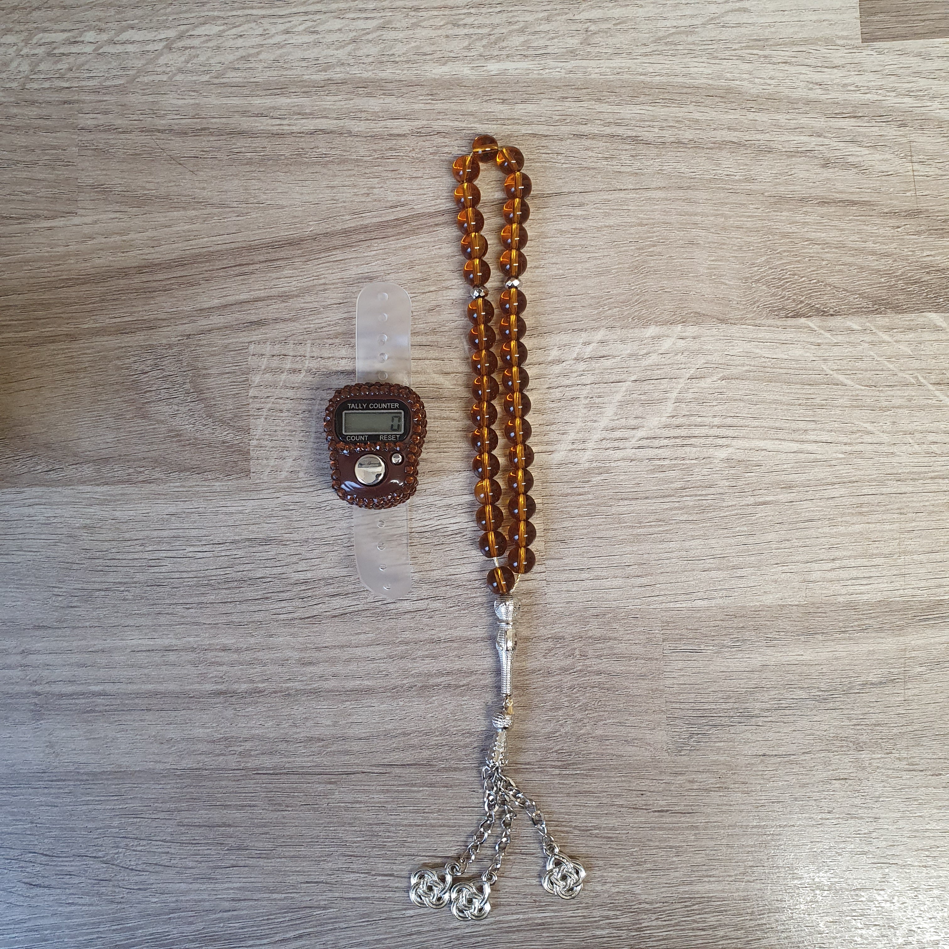Brown islamic tasbeeh misbaha prayer beads with digital tasbeeh