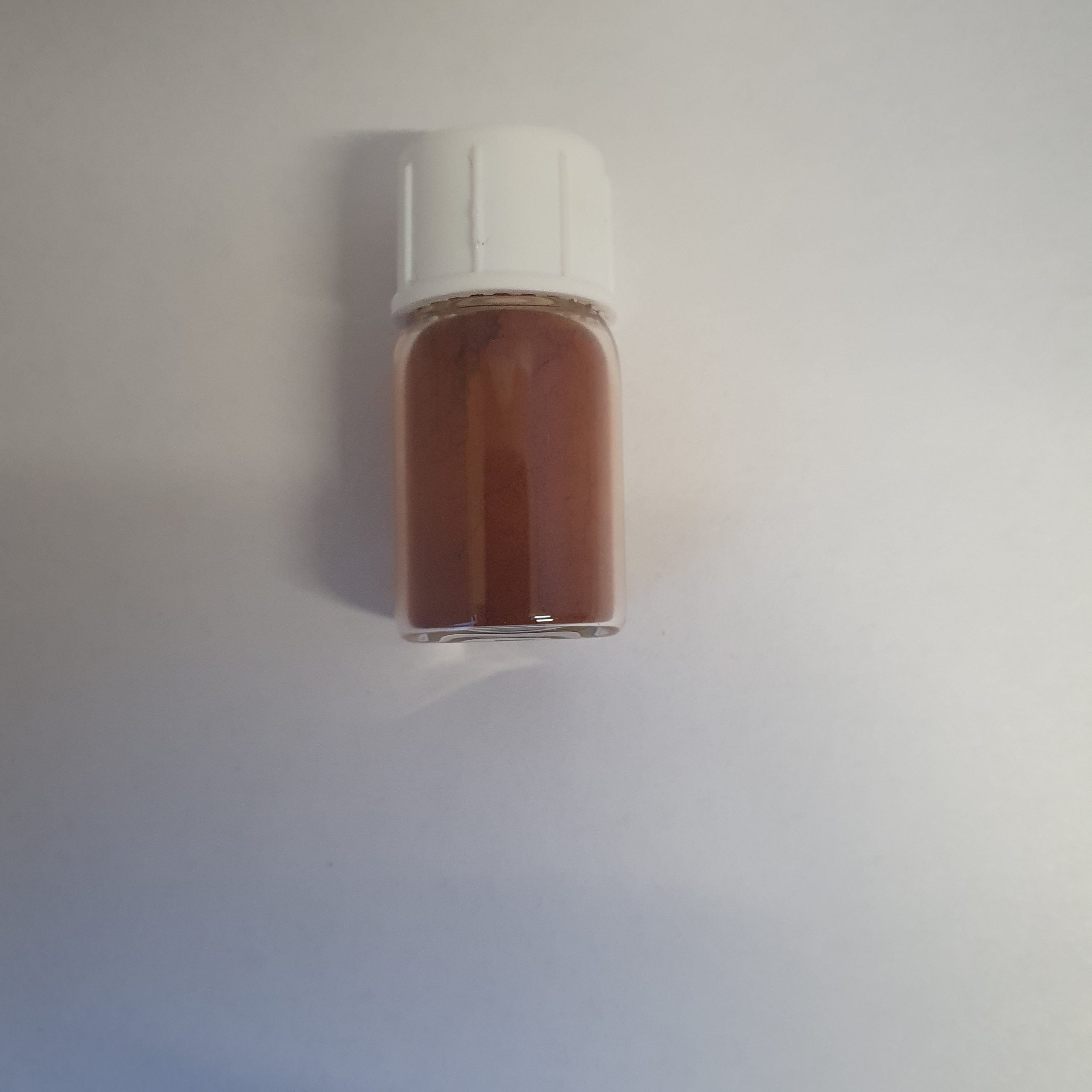 bottle of red isfahani ithmid kohl arabic eyeliner.